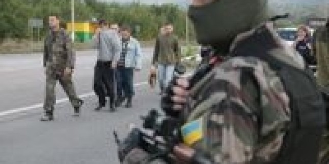 Ukrayna Donbas’tan ağır silahları çekti