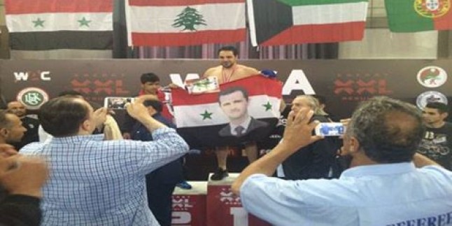 Suriyeli Milli Sporcu, Kazandığı Zaferin Ardından Beşar Esad ve Suriye Bayrağı Açtı